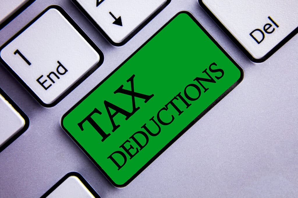 Tax deductions and tax planning concept representing individual, business, trust, and estate tax services.